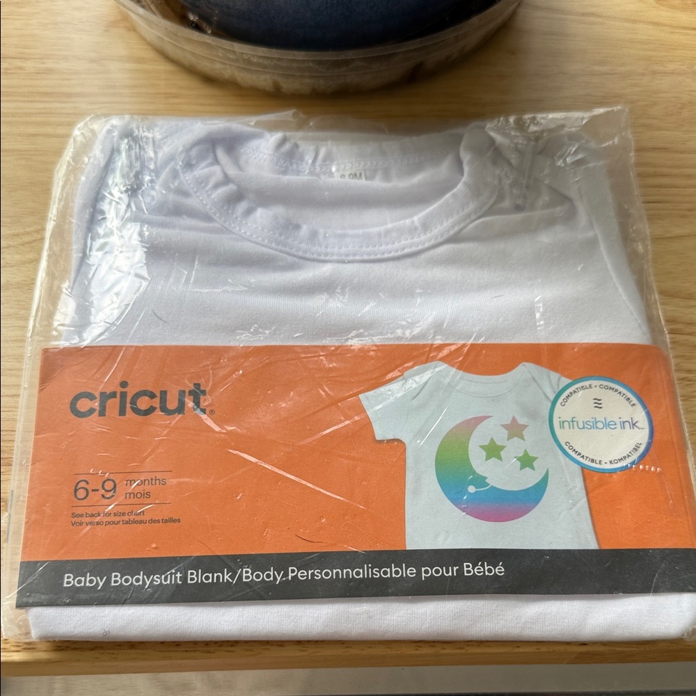 Cricut White Bodysuit with Colorful Moon and Stars